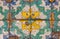damaged and weathered bright and colorful with elegant designs Sicilian tile lose up background