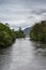 Damaged wooden foot bridge over River Oich, Fort Augustus Scotland.