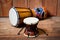 Damaru and djembe drums, percussion and musical instruments