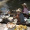 Damnoen Saduak women prepare take away food at the floating market Thailand