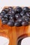 Damsons on wooden chopping board D
