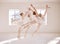 Dance, ballet and dancing ballerina jumping while having an out of body experience in an art studio. Fit, elegant and