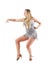 Dance choreography posture of blonde woman in shiny metallic silver dress. Side view.