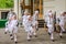 Dance group of young children dancers perform at a children\'s party in front of the audience dressed as penguins and birds