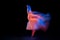 Dance of light and glow. Beautiful grace girl, female ballet dancer dancing isolated over black background in mixed neon