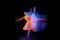 Dance of light and glow. Beautiful grace girl, female ballet dancer dancing  over black background in mixed neon