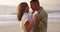 Dance, love or happy couple on sunset beach for romance, vacation or travel celebration. Bonding, affectionate or