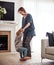 Dance with me Momma. Full length shot of an attractive young mother and dancing with her daughter in the living room at