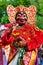 Dancer man in traditional Balinese costume and Topeng Wayang mask