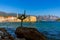 Dancer statue and Old Town in Budva Montenegro