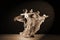 Dancers in ballroom against black background