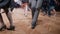 Dancers perform lindy hop dance at the swing festival. Dancing legs close up.