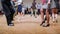 Dancers perform lindy hop dance at the swing festival. Dancing legs close up.