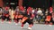 The dancers in red kimonos during the Nihonbashi-Kyobashi Matsuri festival in Tokyo Japan