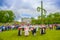 Dancing around the maypole in Midsummer