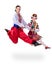 Dancing couple in polish national traditional costume jumping, full length portrait isolated