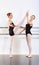 Dancing, girls and teenager in class for ballet with fitness, happy or artistic performance routine. Dance studio