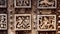 Dancing people on sculpture ceilings of Hindu temple Hoysaleswara with fantastic carvings. Hoysala Empire, India.