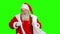 Dancing Santa on green background.