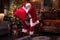 Dancing Santa preparing to congratulate children. Happy Santa Claus listening music and dancing with bag of gifts at