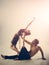 Dancing to the rhythm of love. Young woman and man dance love and romance. Muscular man and cute woman perform modern