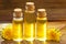 Dandelion essential oil in  beautiful bottle on table