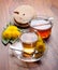Dandelion herbal tea and honey with yellow blossom on wooden table