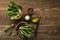 Dandelion leaves on wooden table