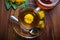 Dandelion tea with honey, yellow blossom in tea cup