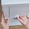 Danger for the baby to pinch the hand of the cabinet door or chest of drawers. Protect children from home furniture, kids safety