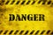 Danger black text on yellow background