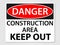 Danger construction sign on a grey background