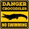 Danger crocodiles no swimming sign