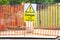 Danger deep excavation sign and orange net security