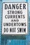 Danger do not swim sign warning of strong currents and undertows