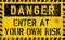 Danger, Enter of your own risk, risk warning or computer virus sign