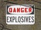 Danger explosives, warning message on signboard,