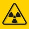 Danger radioactive sign on yellow background. Vector illustration