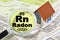 The danger of radon gas in our homes - concept with presence of radon gas under the soil of our cities and buildings with