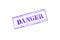 `DANGER ` rubber stamp over a white background