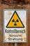 Danger sign `Nuclear Radiation` in a chemical plant