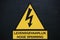 Danger sign for warning that high electricy power can be deadly dangerous in dutch language.