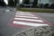 Danger street pedestrian crosswalk with red color.