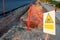 Danger traffic sign, unevenness, in a road paving work