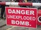 Danger unexploded bomb sign