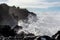 Dangerious ocean stormy waves hits black lava rocks on La Palma island, Canary, Spain