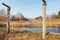 Dangerous area fenced with barbed wire fence