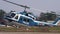 Dangerous close to tail landing of police helicopter Agusta Bell AB-212. Slow motion