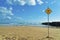 Dangerous Current Warning Sign on Beach