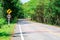 A dangerous curve on a roadway in which drivers cannot see approaching traffic